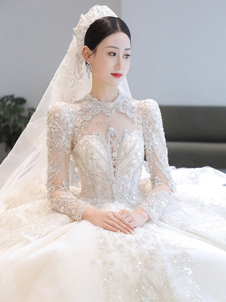 Long Sleeve Wedding Dress 2022 New Bridal Palace Style Main Yarn Large Tail Heavy Industry French Texture Wedding Dress