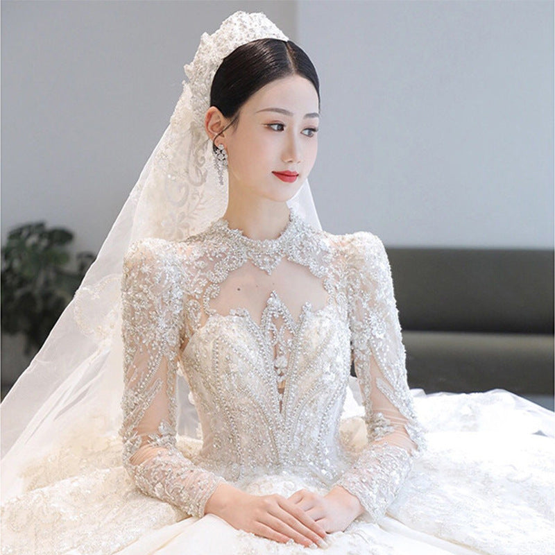 Long Sleeve Wedding Dress 2022 New Bridal Palace Style Main Yarn Large Tail Heavy Industry French Texture Wedding Dress