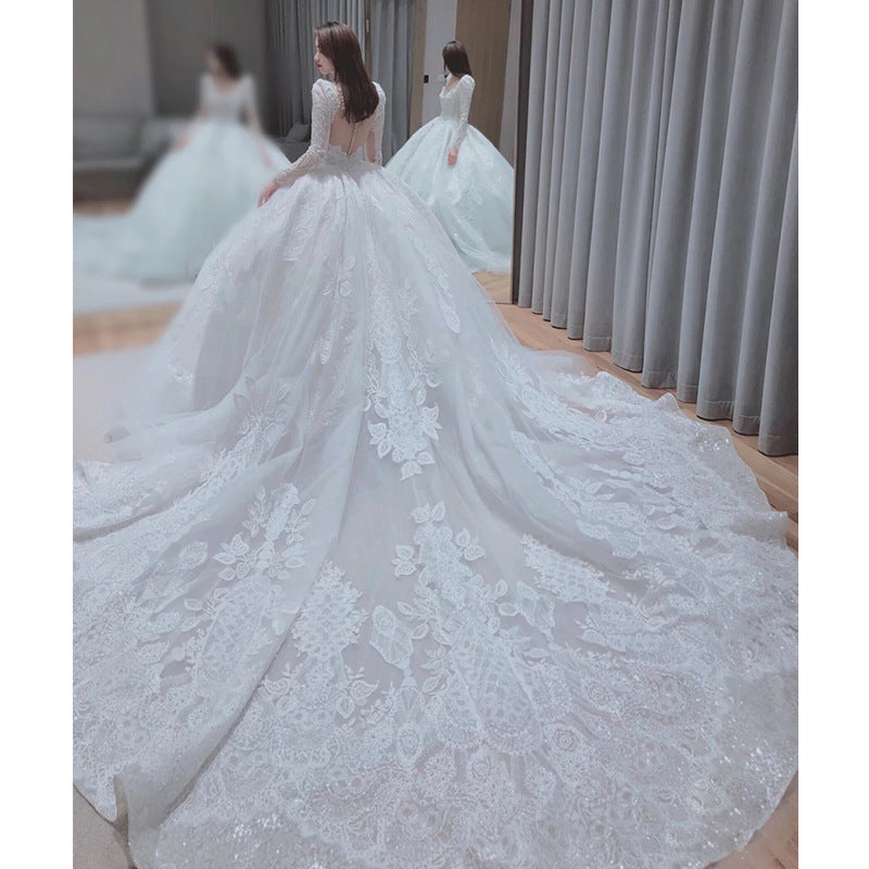 Long trailing wedding dress princess dress lace dress handmade Light main wedding dress 2022 new bride French long sleeves heavy heavy heavy tail simple slim super fairy