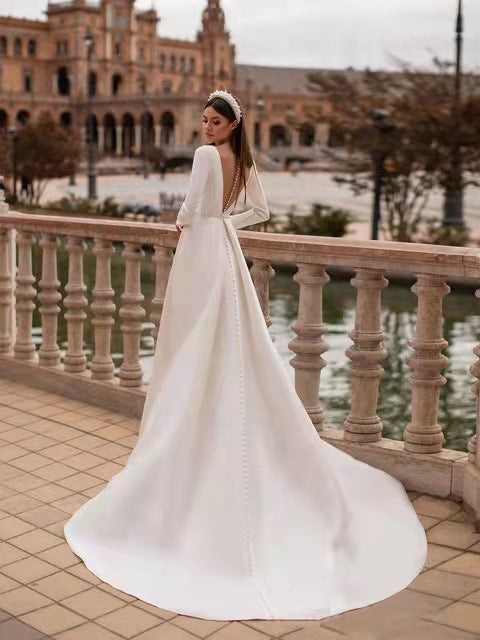 Wedding dress backless pearl long dress long sleeve bridal satin long sleeves slimming simple European and American light train wedding dress