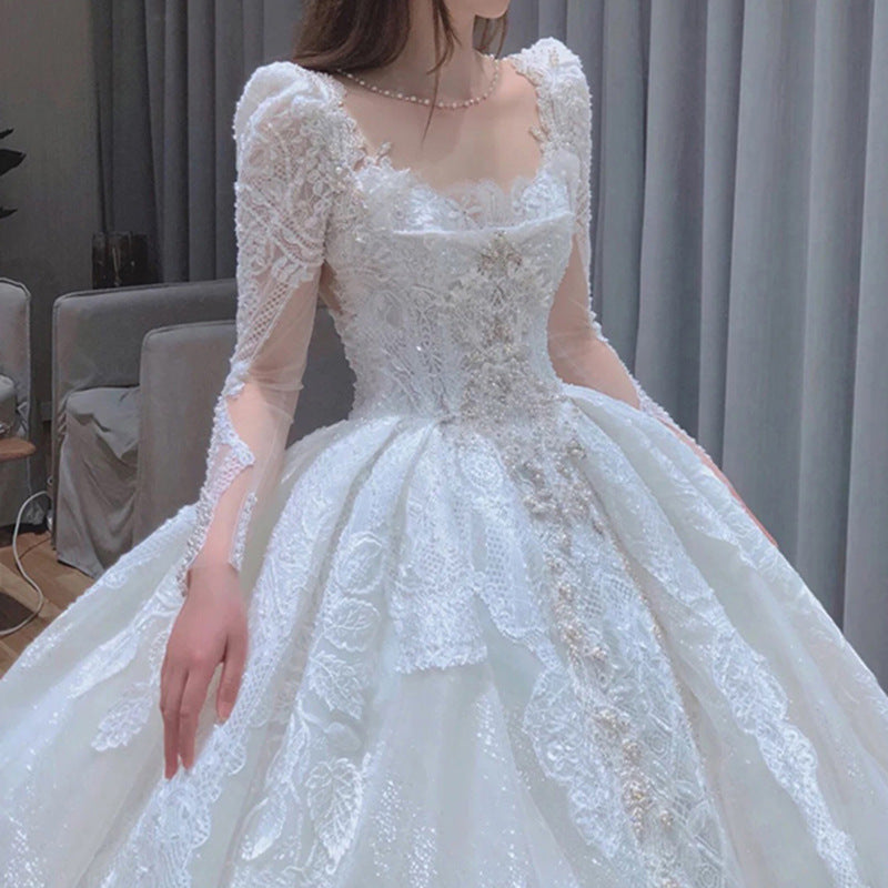 Long trailing wedding dress princess dress lace dress handmade Light main wedding dress 2022 new bride French long sleeves heavy heavy heavy tail simple slim super fairy