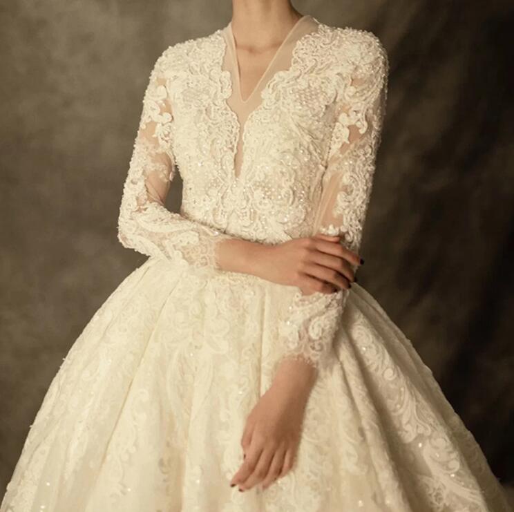 French long-sleeve wedding dress princess 2022 new bride wedding big tail palace wind main yarn wedding dress fall