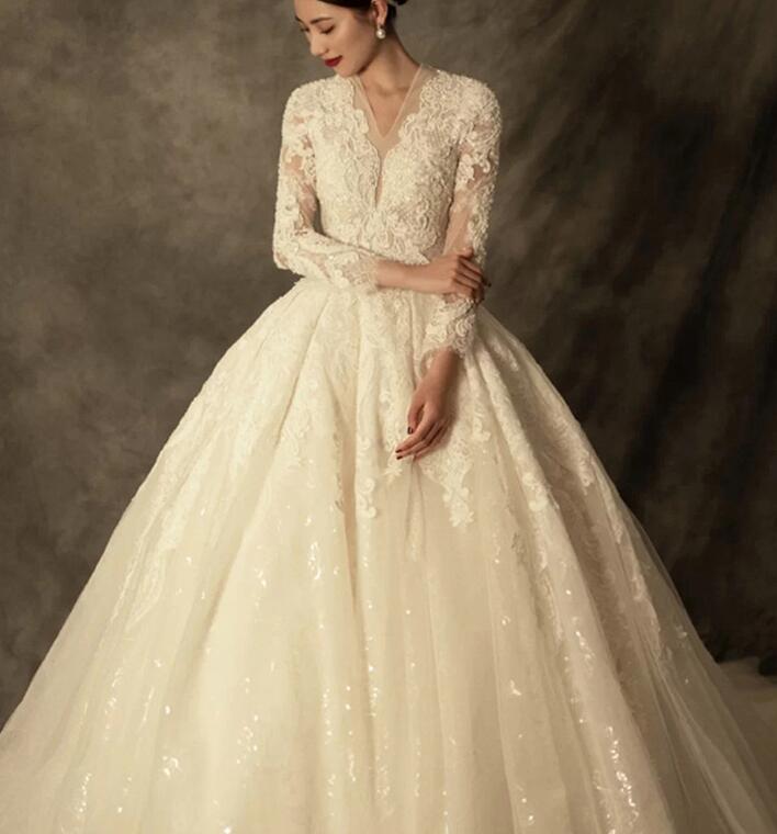 French long-sleeve wedding dress princess 2022 new bride wedding big tail palace wind main yarn wedding dress fall