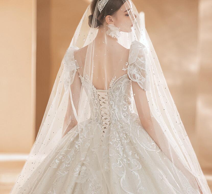 Wedding dress 2022 new summer French palace wind drag tail luxury senior temperament show thin