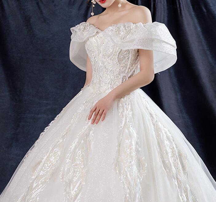 off shoulder dress Wedding dress French light wedding dress 2022 new temperament one shoulder bride Sen super fairy dream heavy industry wedding dress