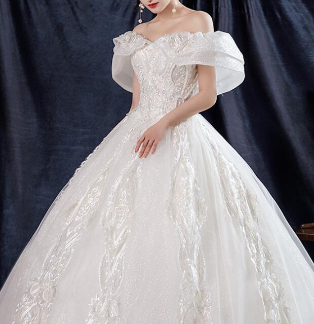 off shoulder dress Wedding dress French light wedding dress 2022 new temperament one shoulder bride Sen super fairy dream heavy industry wedding dress