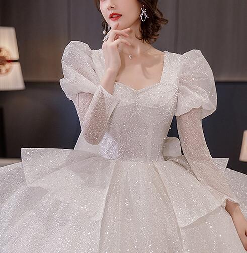 Wedding dress evening dress  bride long sleeves big tail princess wind small cover arm wedding dress women spring