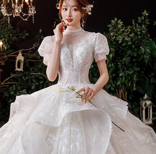 Lace fairy dress princess dress French wedding dress 2022 spring new bride main yarn heavy atmosphere palace princess wind drag wedding dress