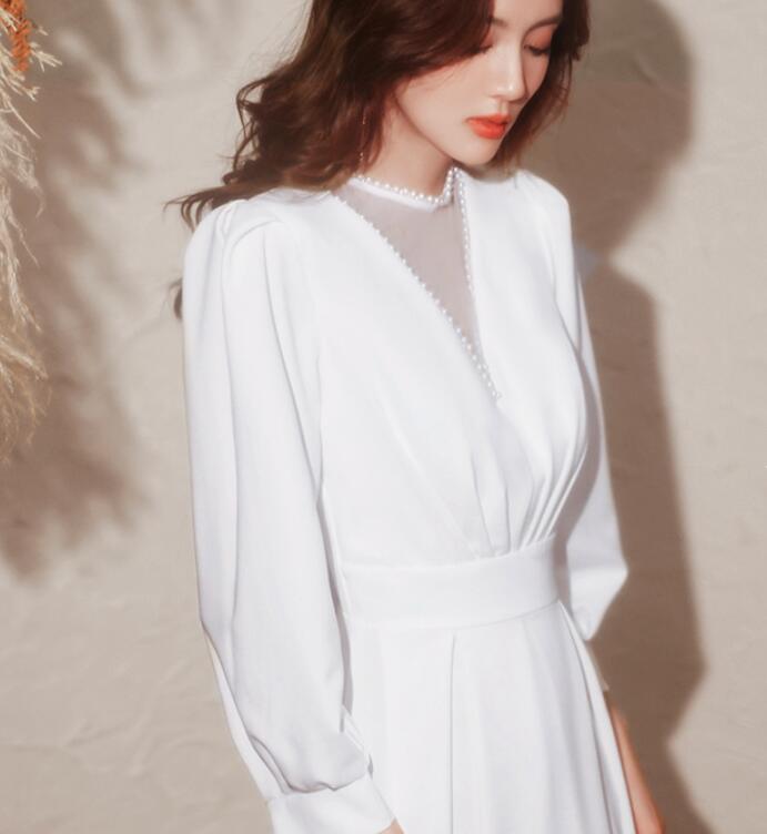 White evening dress 2022 new spring long sleeve annual meeting host French dress temperament can wear at ordinary times