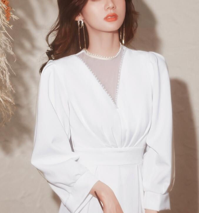 White evening dress 2022 new spring long sleeve annual meeting host French dress temperament can wear at ordinary times