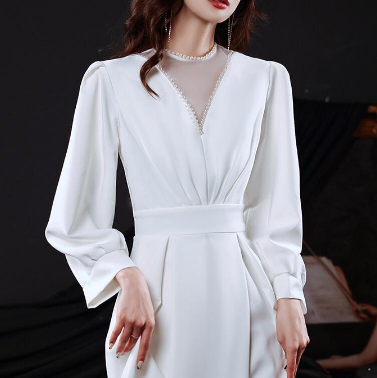 White evening dress 2022 new spring long sleeve annual meeting host French dress temperament can wear at ordinary times