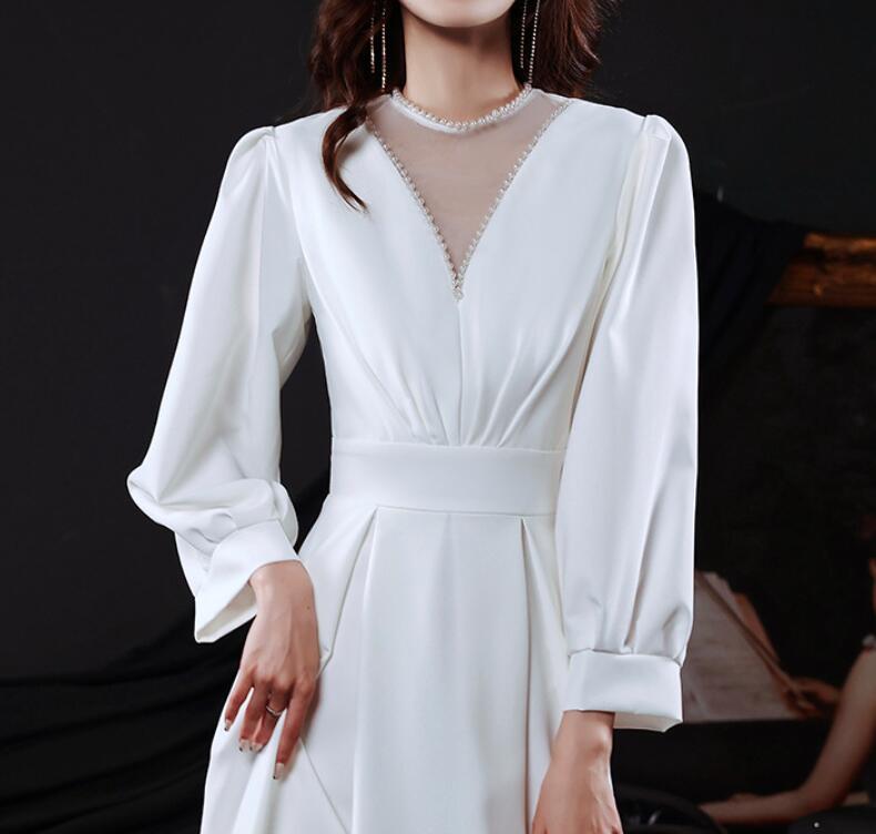 White evening dress 2022 new spring long sleeve annual meeting host French dress temperament can wear at ordinary times