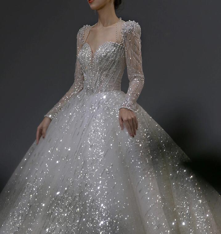 Light wedding dress 2022 new bride main yarn French style long sleeves court wind big tail heavy industry