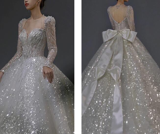 Light wedding dress 2022 new bride main yarn French style long sleeves court wind big tail heavy industry