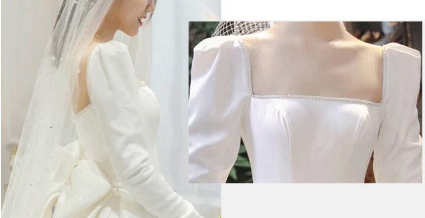 French satin light wedding dress 2022 New main wedding dress big tail cover thick arms long sleeves spring out yarn