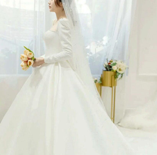 French satin light wedding dress 2022 New main wedding dress big tail cover thick arms long sleeves spring out yarn