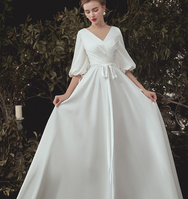 Wedding dress 2022 The new bridal gown is super fairy dream simple long sleeve satin cover arm tail