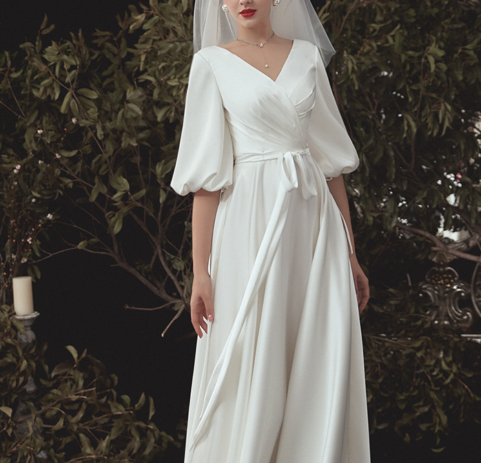 Wedding dress 2022 The new bridal gown is super fairy dream simple long sleeve satin cover arm tail