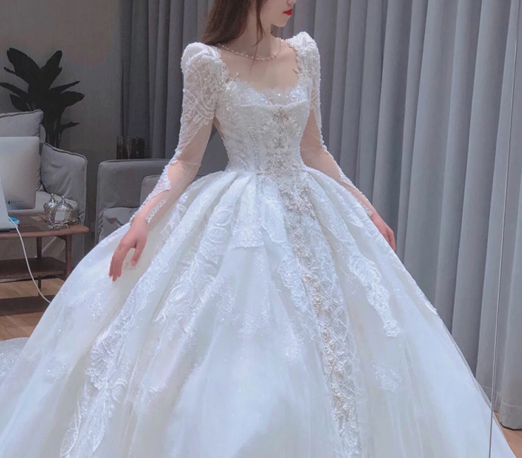 Long trailing wedding dress princess dress lace dress handmade Light main wedding dress 2022 new bride French long sleeves heavy heavy heavy tail simple slim super fairy