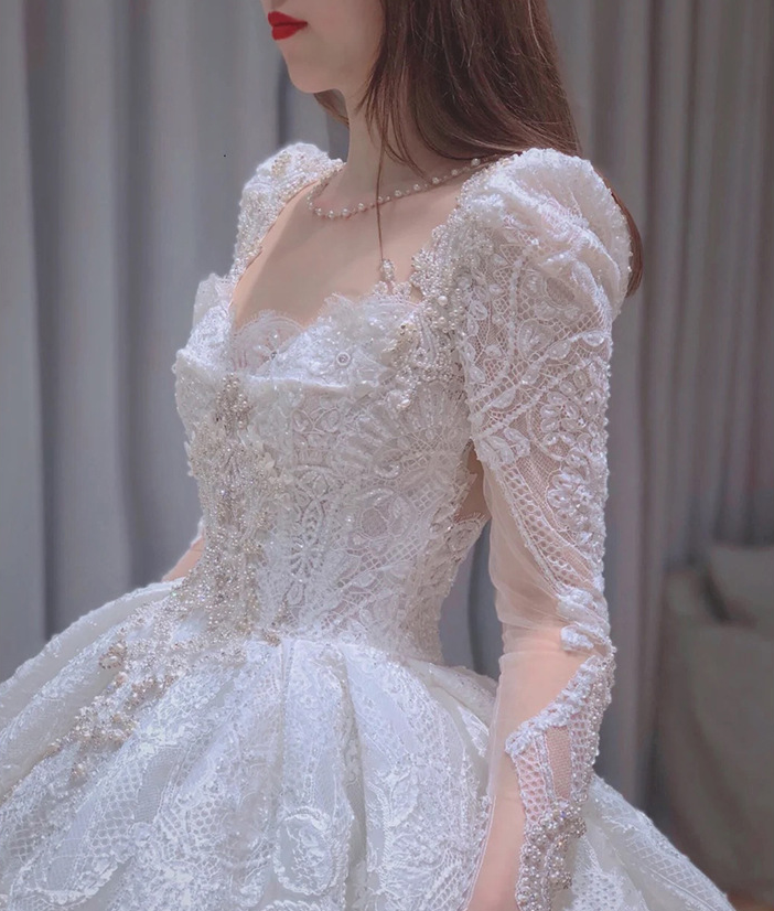 Long trailing wedding dress princess dress lace dress handmade Light main wedding dress 2022 new bride French long sleeves heavy heavy heavy tail simple slim super fairy