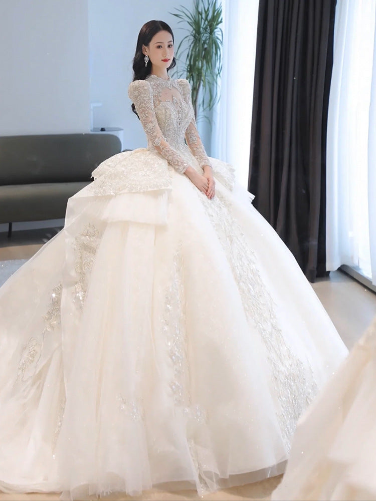 Long Sleeve Wedding Dress 2022 New Bridal Palace Style Main Yarn Large Tail Heavy Industry French Texture Wedding Dress