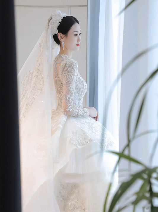 Long Sleeve Wedding Dress 2022 New Bridal Palace Style Main Yarn Large Tail Heavy Industry French Texture Wedding Dress